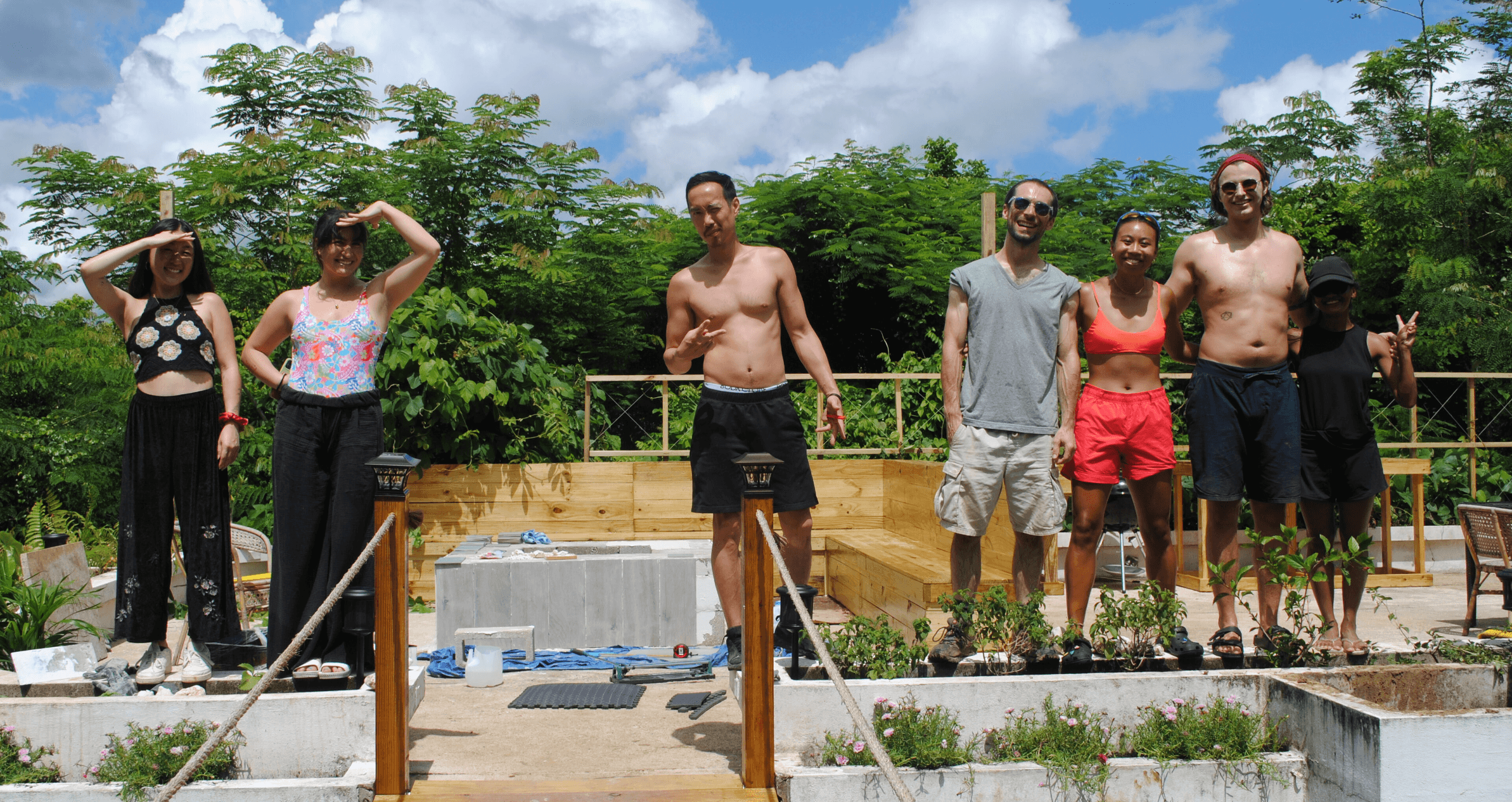 An outdoor patio and the Cabin build crew that made it happen