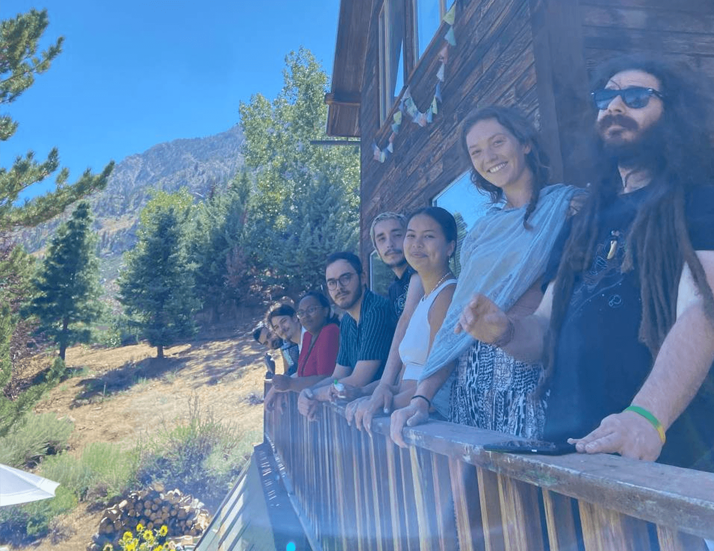 some of the Montaia crew looking at the mountains and cheesing for the camera