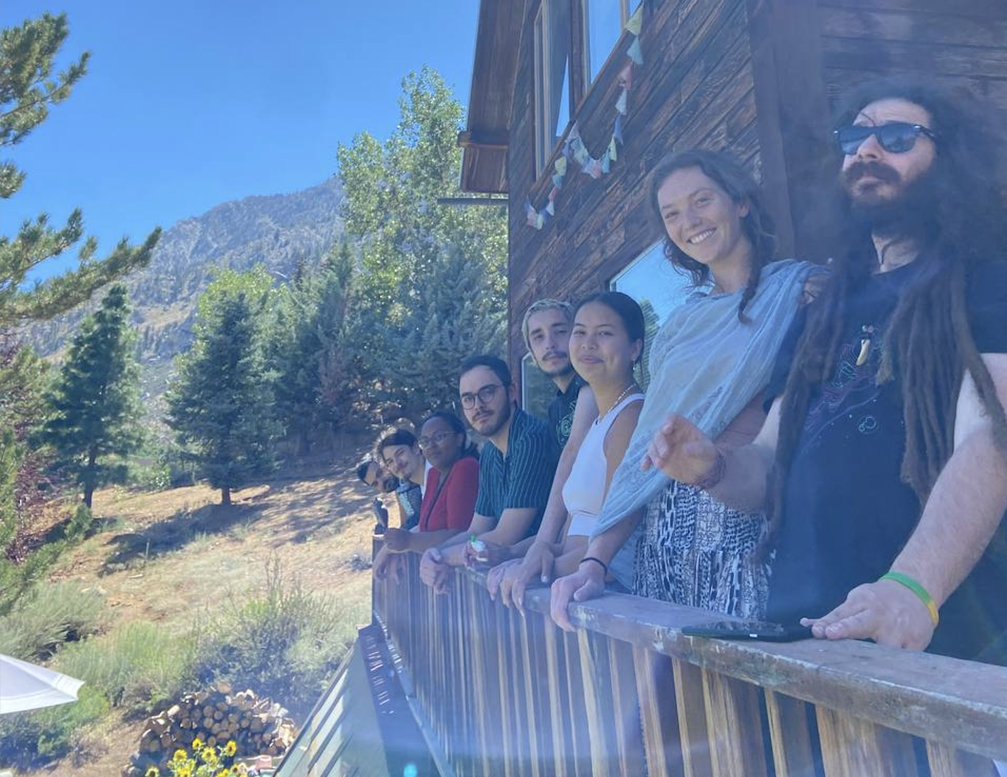 some of the Montaia crew looking at the mountains and cheesing for the camera